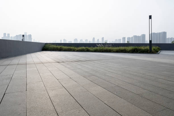 istock At sunset, the empty squares of the modern city 1393232811