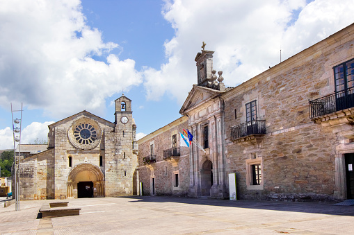 Ancient Santa María church and Town Hall in Meira, Lugo province, Galicia, Spain, part of an ancient monastery. Beautiful town square.