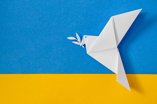 The dove of peace and the flag of Ukraine as a symbol of no war and conflict. Patriotism and politics so that there is national freedom and love.