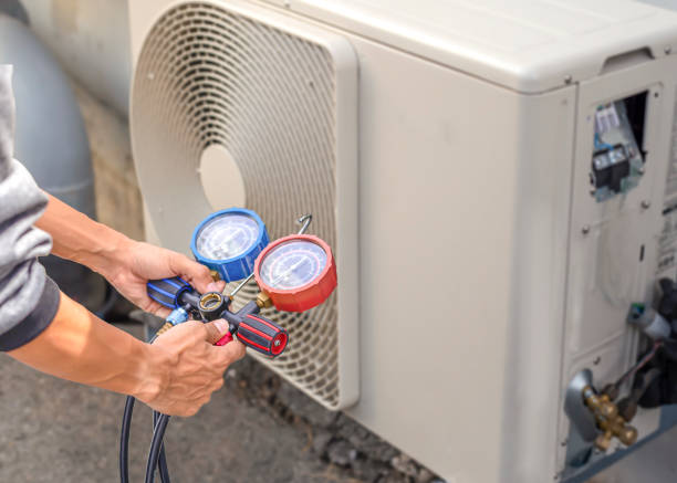 istock Technician checking the operation of the air conditioner 1393252819