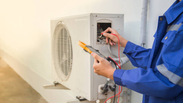 istock Technician checking the operation of the air conditioner 1393252820