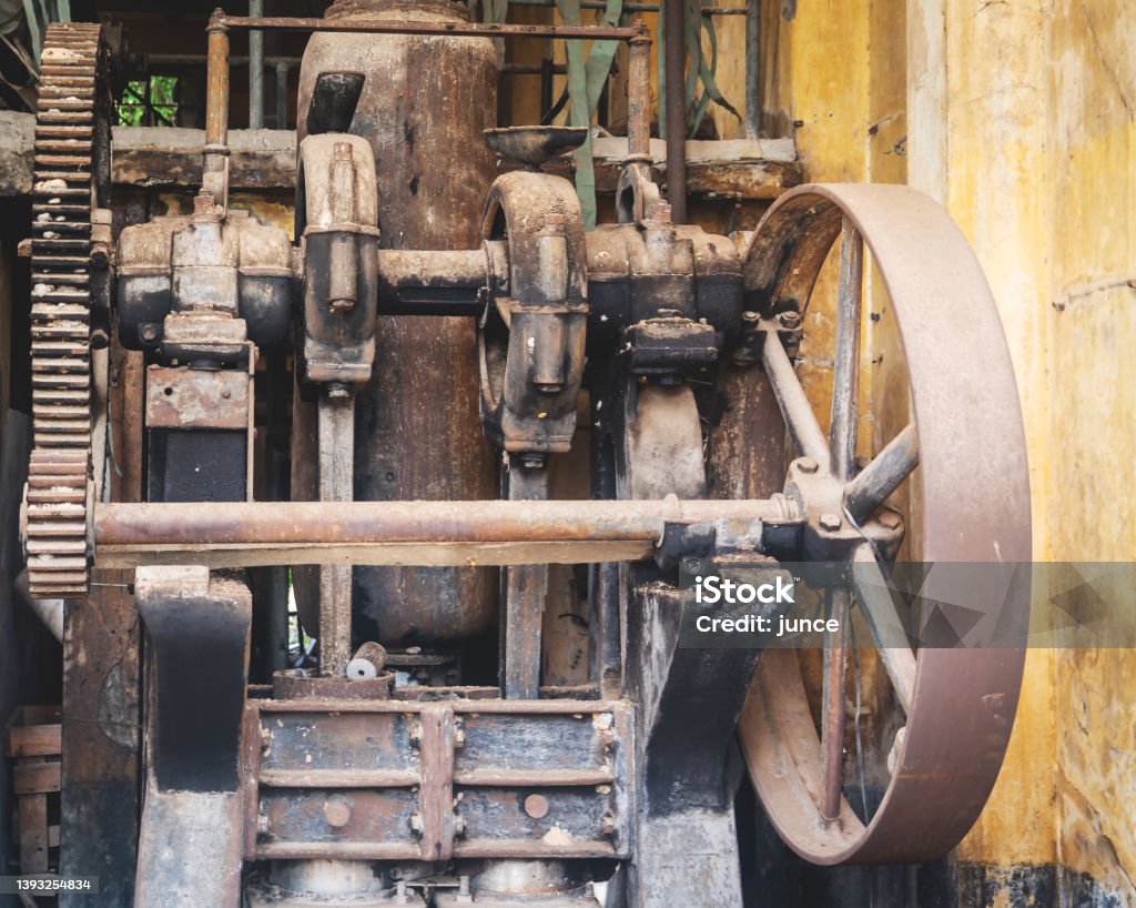 Old rustic factory machinery in an abandond factoy. Abandoned Stock Photo