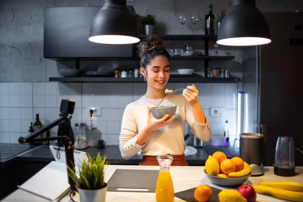 istock A young woman eats oatmeal 1393258756