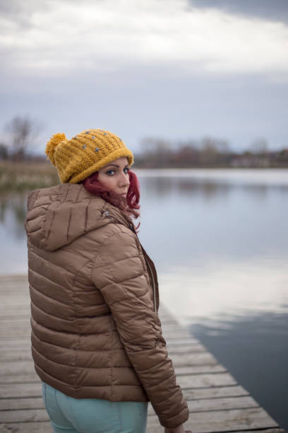 istock female passenger with suitcase on lake 1393261394