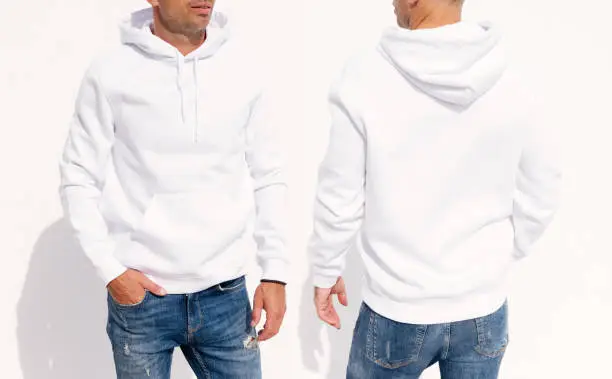 Photo of Model wearing white men's hoodie, mockup for your own design