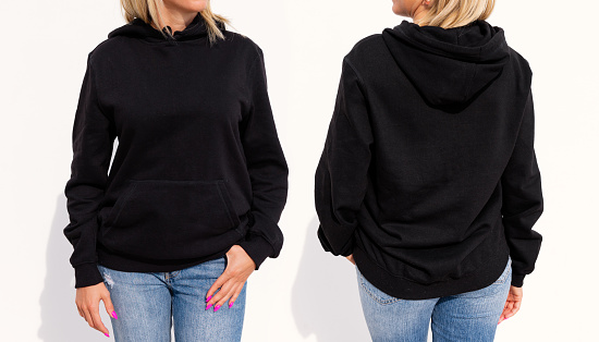 Model wearing black women's hoodie, mockup for your own design