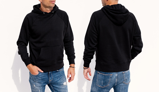 Model wearing black men's hoodie, mockup for your own design
