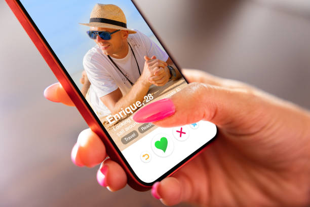 istock Woman using online dating app on her mobile phone 1393264554