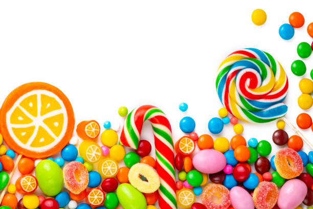 istock Colorful lollipops and different colorful round candy. Top view. 1393265399