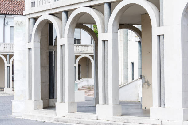 Tresigallo,Italy-may 2, 2021:detail of the porch in Tresigallo during a cloudy day
