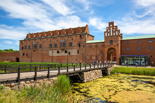 People walking at the Yokohama Red Brick Warehouse, a historical building that is used as a complex that includes a shopping mall, banquet hall, and event venues. The complex was originally used as customs buildings and is located at the Port of Yokohama in Naka-ku, Yokohama, Kanagawa, Japan.