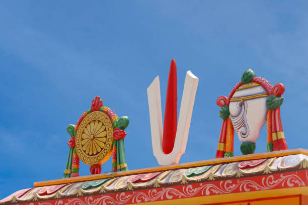 istock Perumal Naama statue with Shanku and Chakra on Temple tower 1393270627