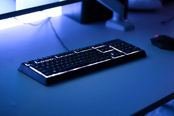 istock a mechanical gaming computer keyboard with rgb led backlight on the table at night 1393270918