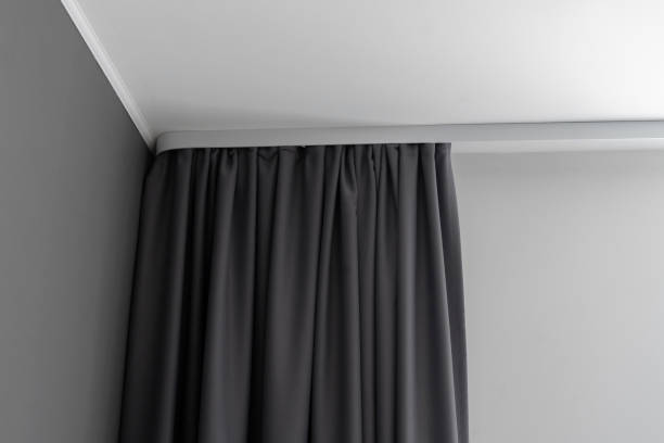 istock abstract grey color curtains at home on white railings 1393274618