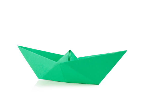 istock Green Paper Boat 1393275818