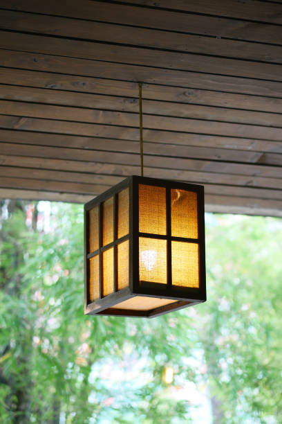 istock a glowing lamp in a nature with copy space 1393276664