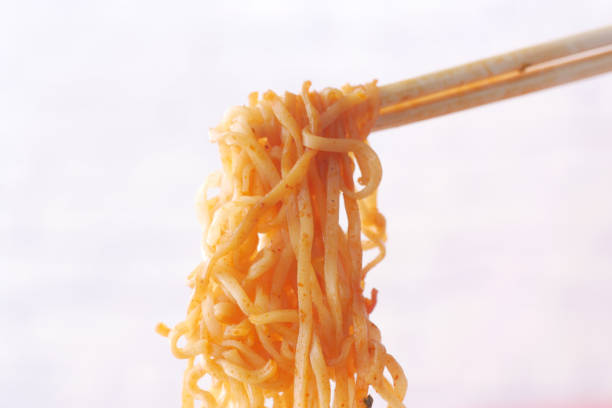 noodles with chopsticks on white background ,