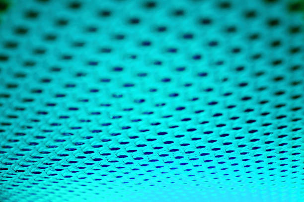 istock Neon turquoise abstract pattern with holes and lines 1393276765