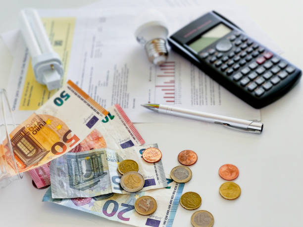 istock Detail of electricity bill with light bulb 1393276908