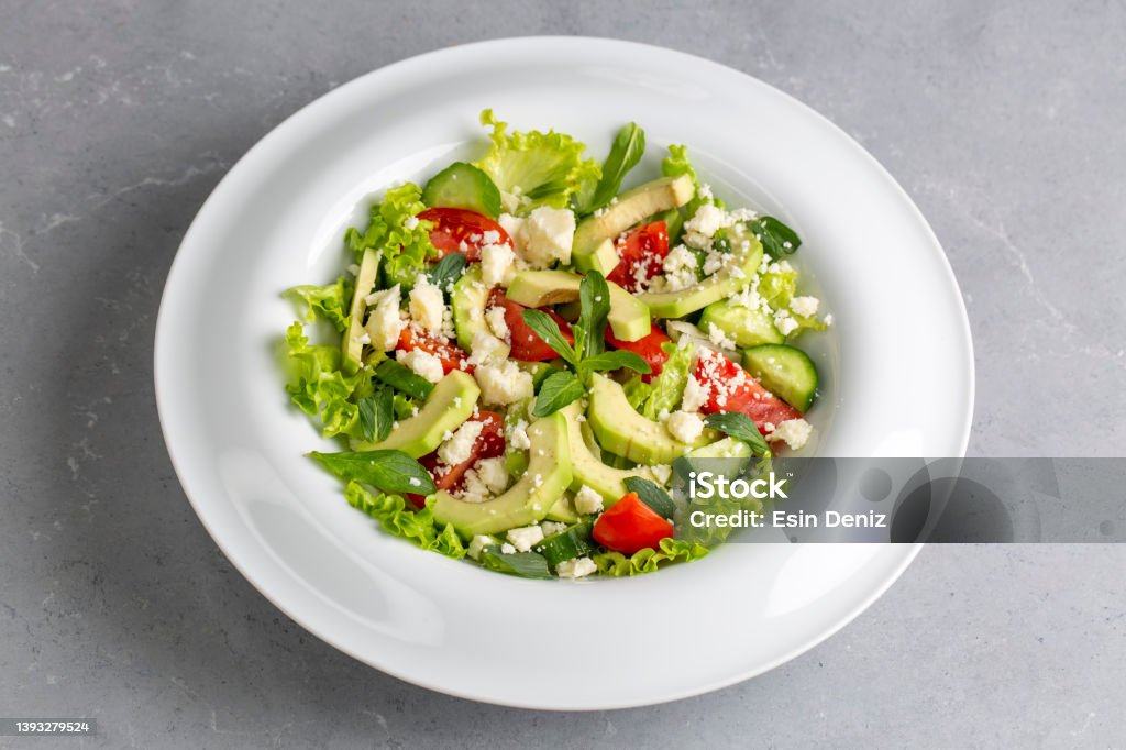 Avocado salad with lettuce and cheese Appetizer Stock Photo