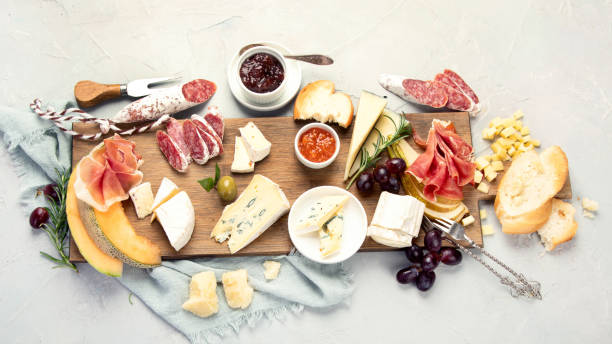 cheese assortment on light background. - italian cuisine wine food pasta imagens e fotografias de stock