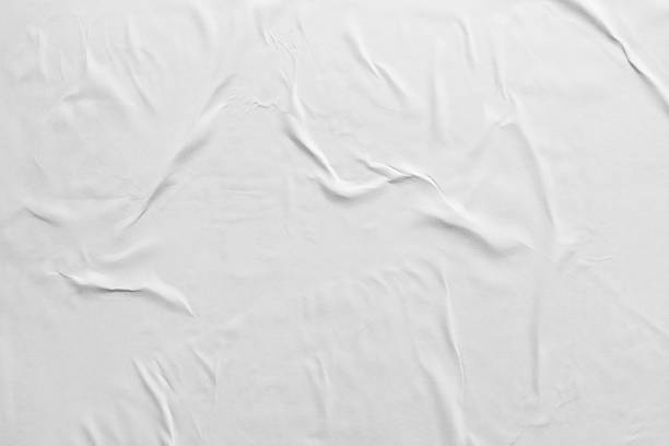 Wrinkled white poster paper texture background