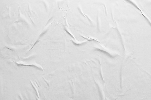 Wrinkled white poster paper texture background