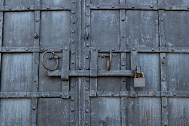 istock closed metal door with lock 1393284098