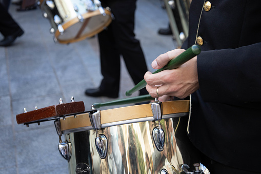Drum musician playing in the street in the Holly week in Cordoba, Spain.