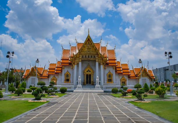 istock Wat Benchamabophit. Marble temple with old and magnificent Buddha images. 1393290244