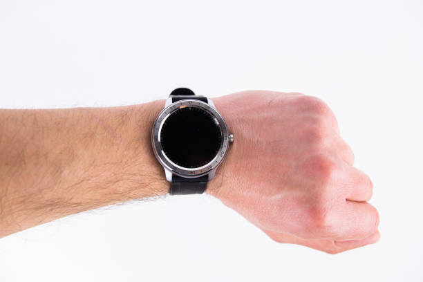 istock round smart watch on a male hand on a white background 1393318147