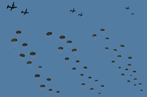 Paratroopers jumping at the military training
