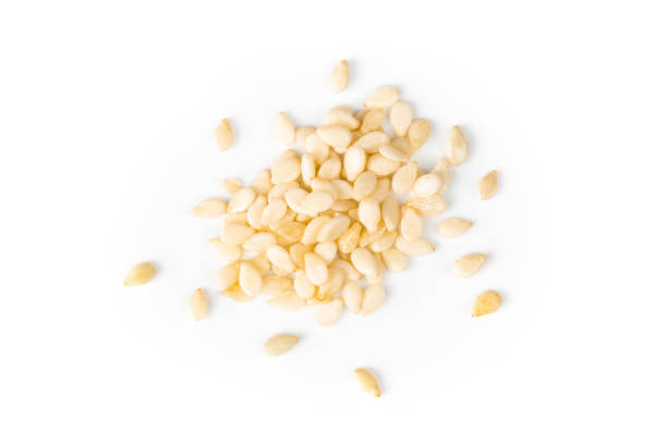 istock sesame seeds macro, isolated on white background closeup 1393334862