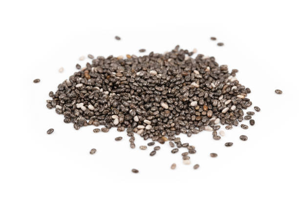 istock chia seeds macro, salvia hispanica isolated on white background 1393335417