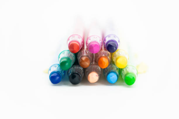 colorful pen over on white background, out of focus
