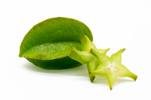 istock whole slices carambolas or Star fruit on white background. 1393342742