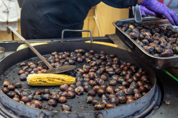 istock Grilled chestnut and cob. Barbecue with charcoal fire 1393343020