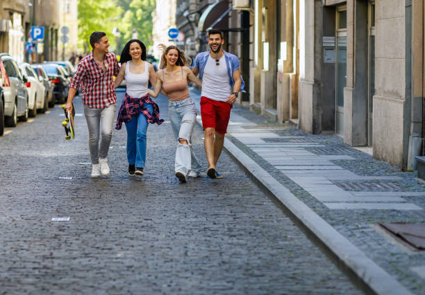 istock Group of tourists having a good time outdoor 1393343232