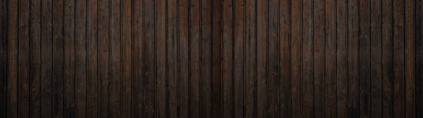 istock old brown rustic dark wooden texture - wood timber table background panorama long banner 1393343471