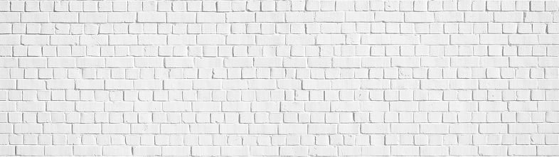 White gray light damaged rustic brick wall brickwork stonework masonry texture background banner panorama