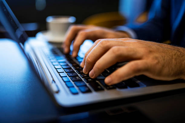 istock Unrecognizable person typing on laptop 1393344645