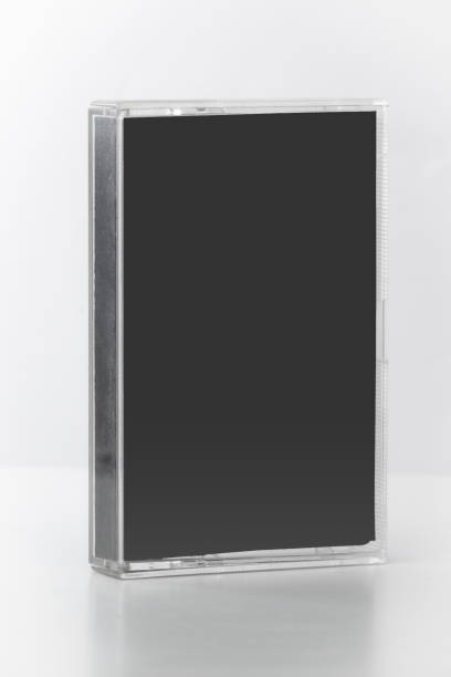 istock Blank compact cassette tape box label design mockup. Vintage cassete tape record case box mock up. Plastic analog magnetic tape cassette clear packaging template. Mixtape box cover 1393345526