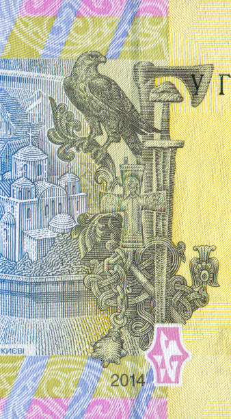 istock Eagles, Cross and Weapons Badge Pattern Design on Ukrainian Banknote 1393346272