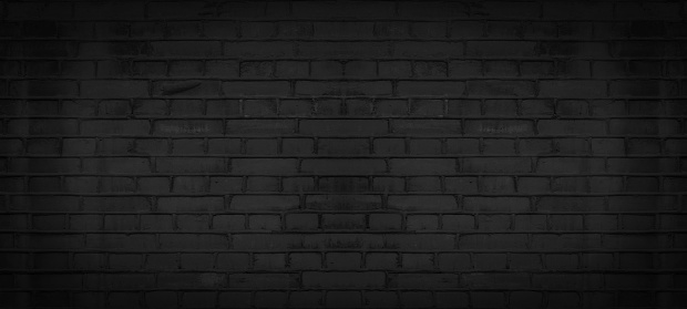 Black anthracite gray grey damaged rustic brick wall brickwork stonework masonry texture background banner panorama pattern template architecture