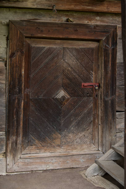 istock Old wooden rustic doors. 1393347990