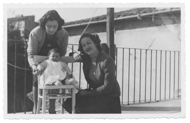 Family in 1949. Family on balcony in 1949. 90 plus years photos stock pictures, royalty-free photos & images