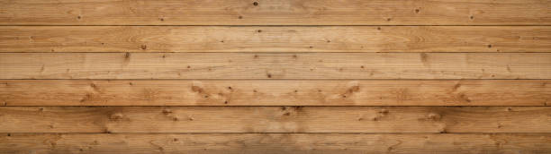 velha luz marrom rústica textura de madeira brilhante - madeira fundo panorama bandeira longa - wood plank textured wood grain - fotografias e filmes do acervo