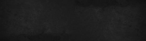 istock Black anthracite stone concrete texture background panorama banner long 1393350642