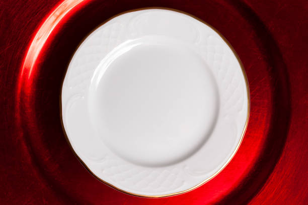 Directly above view of single empty plate on table