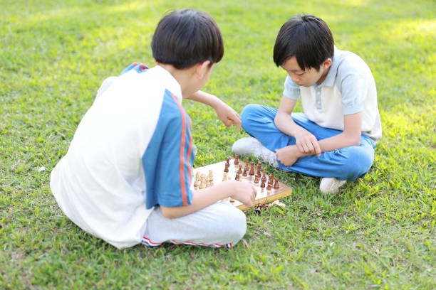 istock Children started the classic a chess match outdoors 1393352286